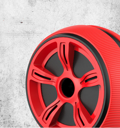 Close-up of red abdominal fitness roller wheel showing durable PP bracket and textured TPR surface for stability.