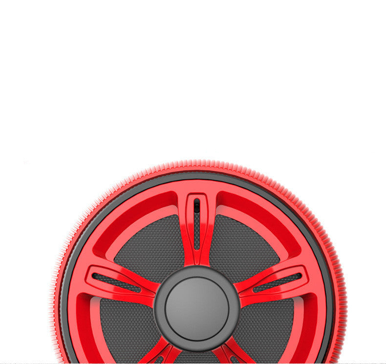 Front view of red abdominal wheel with black center hub and textured surface, built for home fitness and core training.