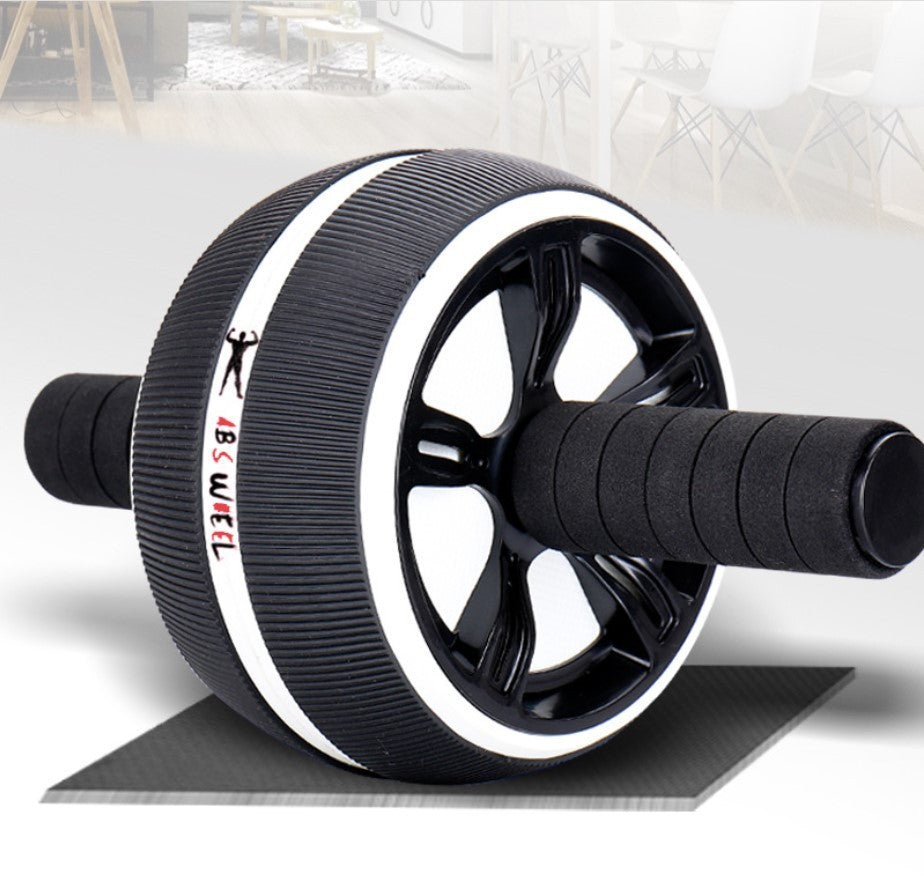 Black and white abdominal wheel with ergonomic handles and anti-slip mat, perfect for home abdominal workouts.