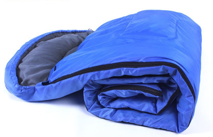 Folded blue Camping Sleeping Bag - Light Waterproof with visible zipper and soft inner lining, ideal for travel and outdoor use.
