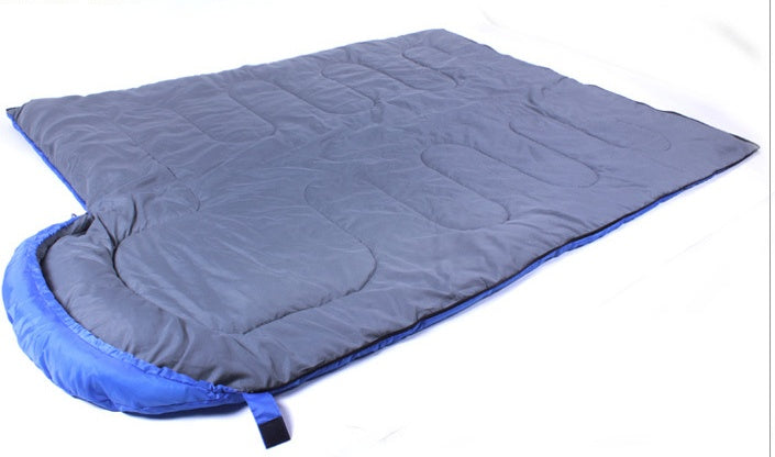 Unzipped Camping Sleeping Bag - Light Waterproof laid flat as a blanket, showing dual-use design and spacious interior.
