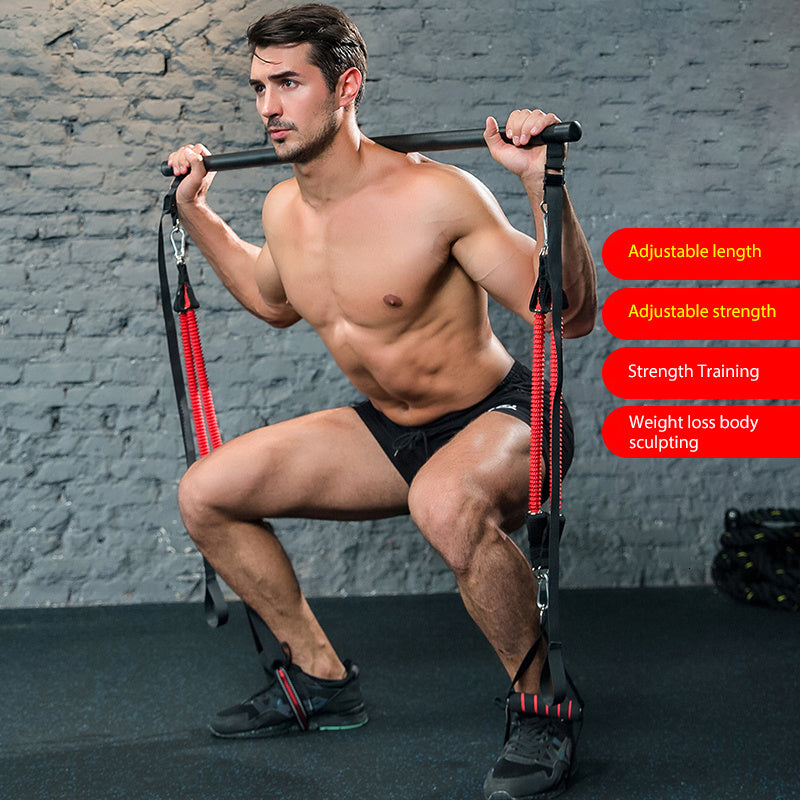 Man performing squats using Trainer Bar Resistance Bands - Body Workout for strength training and adjustable resistance fitness.