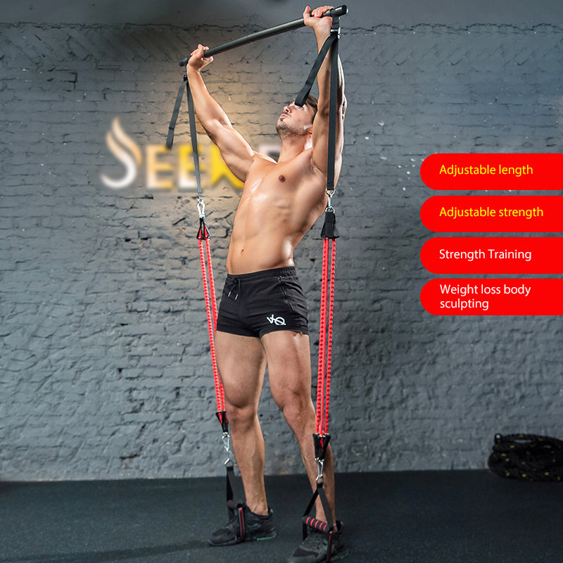 Man lifting Trainer Bar Resistance Bands - Body Workout overhead, showcasing adjustable strength and full-body training.