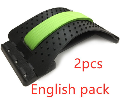 Lumbar Tractor Therapy back stretcher with green foam pad and black spiked surface for massage and support. Ideal for back pain relief.
