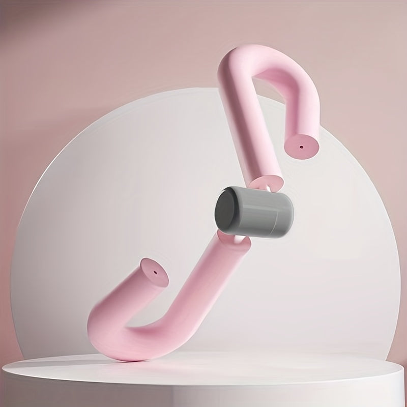 Pink Thigh Master Exercise Tool with ergonomic foam handles. Ideal for home workouts targeting thighs, arms, and hips.