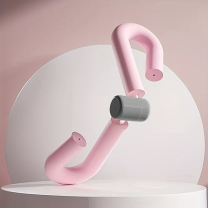 Pink Thigh Master Exercise Tool with ergonomic foam handles. Ideal for home workouts targeting thighs, arms, and hips.