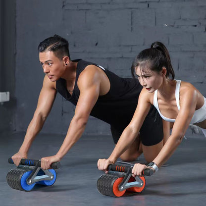 Man and woman using Automatic Rebound Ab Wheel Roller Waist Trainer Gym in a gym setting, showcasing dual-wheel design for stability.