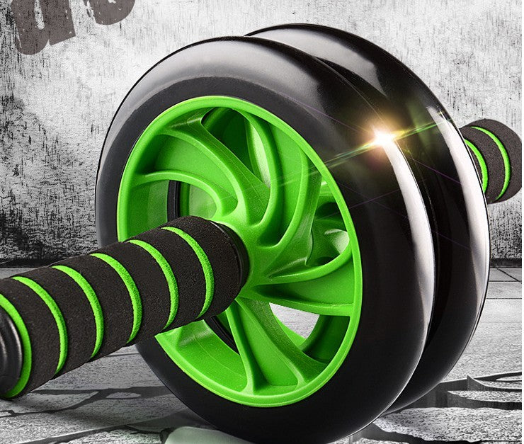 Green and black Fitness Master Ab Roller Trainer with foam grip handles. High-elasticity wheel design for smooth and silent ab exercises.