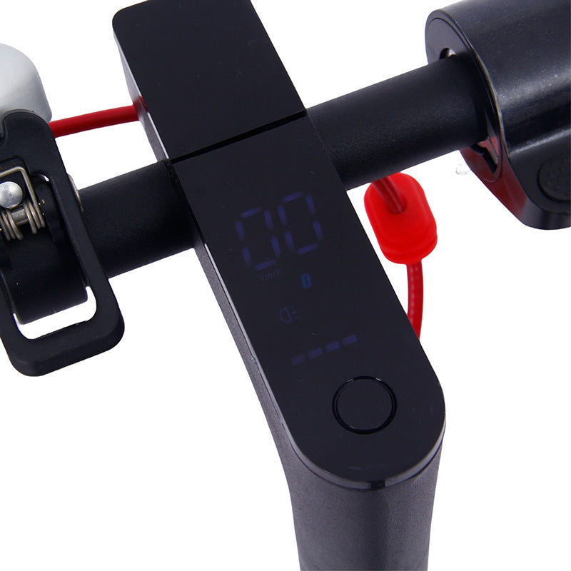Digital display panel on Foldable Electric Scooter showing speed and battery level, integrated into the handlebar for easy monitoring.